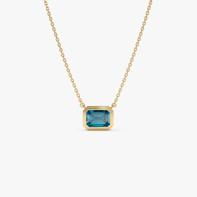 14K Gold 1.25 ctw Emerald Cut Bezel Setting Blue Topaz 14K Gold Ferkos Fine Jewelry